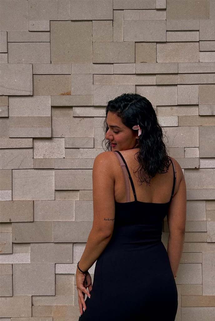 Laboni High-Profile Escort in chic black attire highlighting confident and classy personality