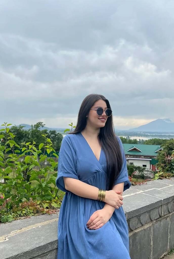 Esha Celebrity Escorts stylish look in blue outfit with mountain view